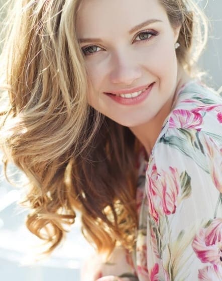 woman smiling in the sun