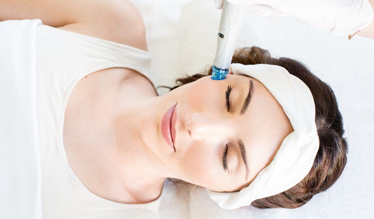 Patient receiving hydra facial treatment